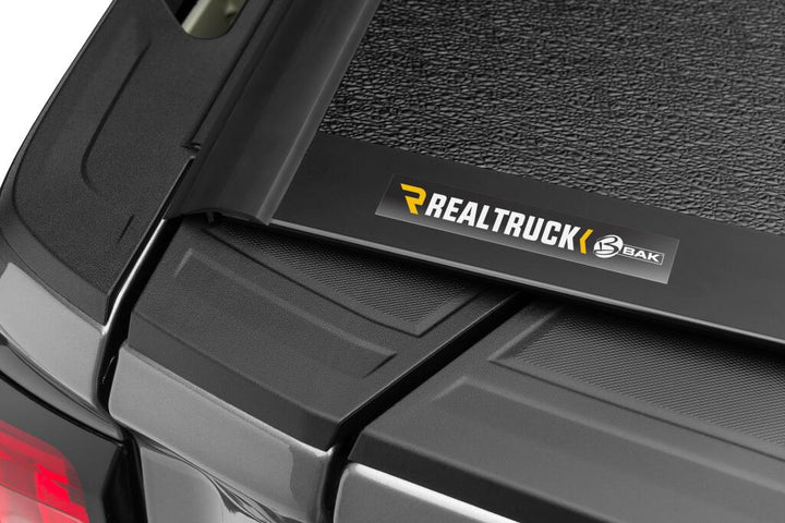 BAK BAKFlip F1 Hard Folding Truck Bed Cover 2014-2018 (2019 Legacy/Limited) Silverado/Sierra 5 Foot 9 Inch Bed